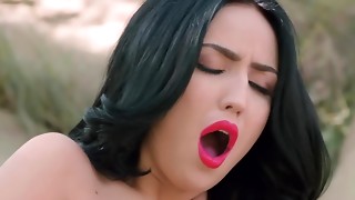 Brunette in golden high heels thrusts thumbs into vulva