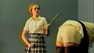 b. Femdom Caning