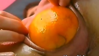 Nasty whore sticks food in gaping hole